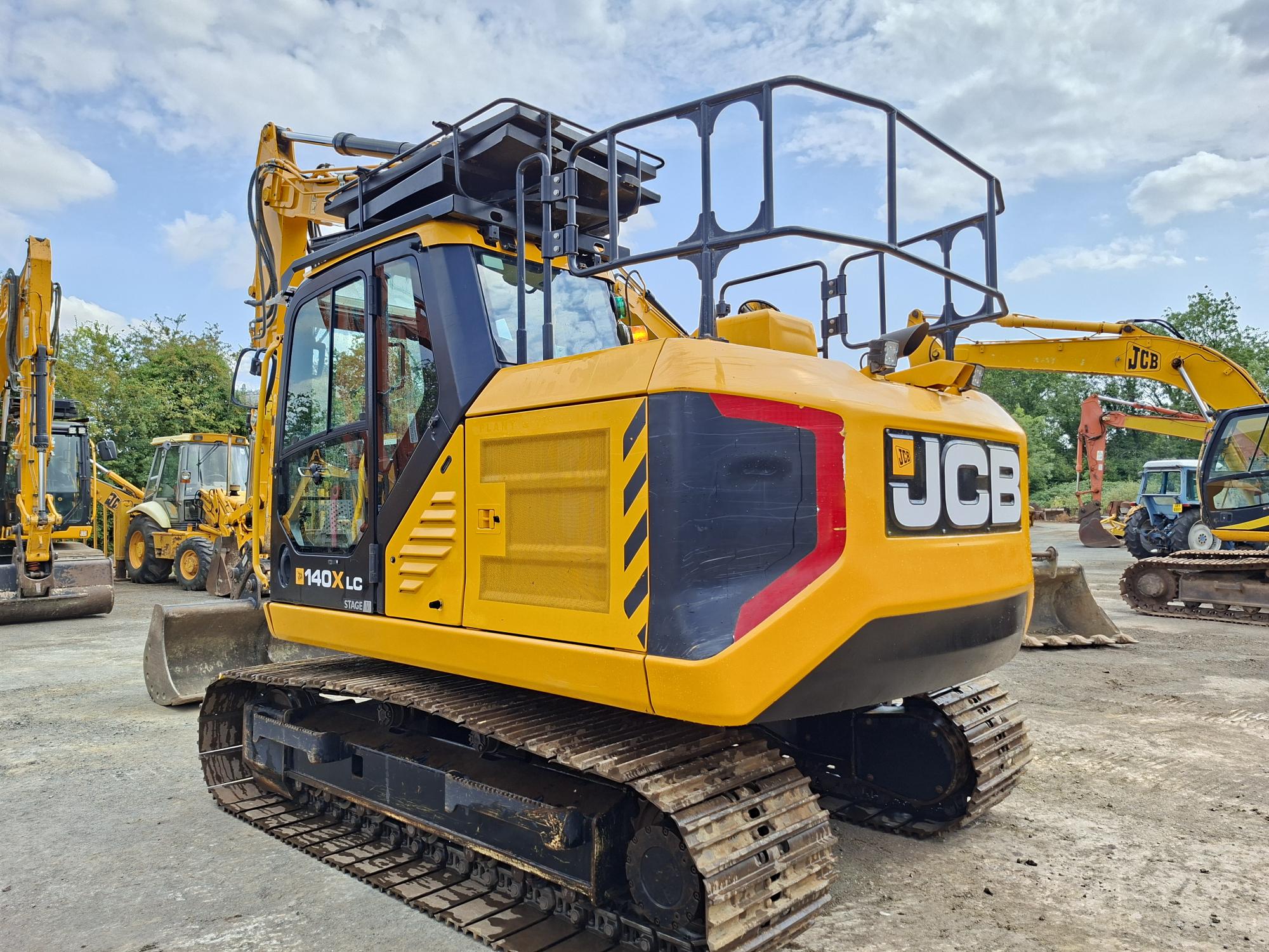 2022 JCB 140X, Hydraulic Quick hitch, High & low flow aux pipework, C/V's, Vandal guards, Cameras, A/C, Orange & Green beacons, Radio, Only 1258 hours. Very nice low hour machine.-image